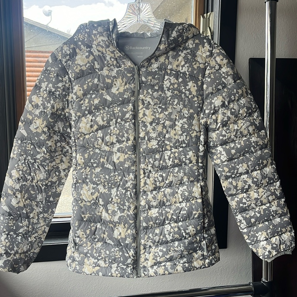 Beautiful Women’s light puffy jacket with hood